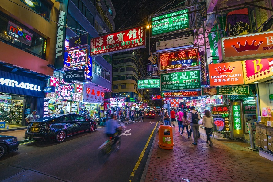 man-riding-bike-on-street-during-nighttime-2321188