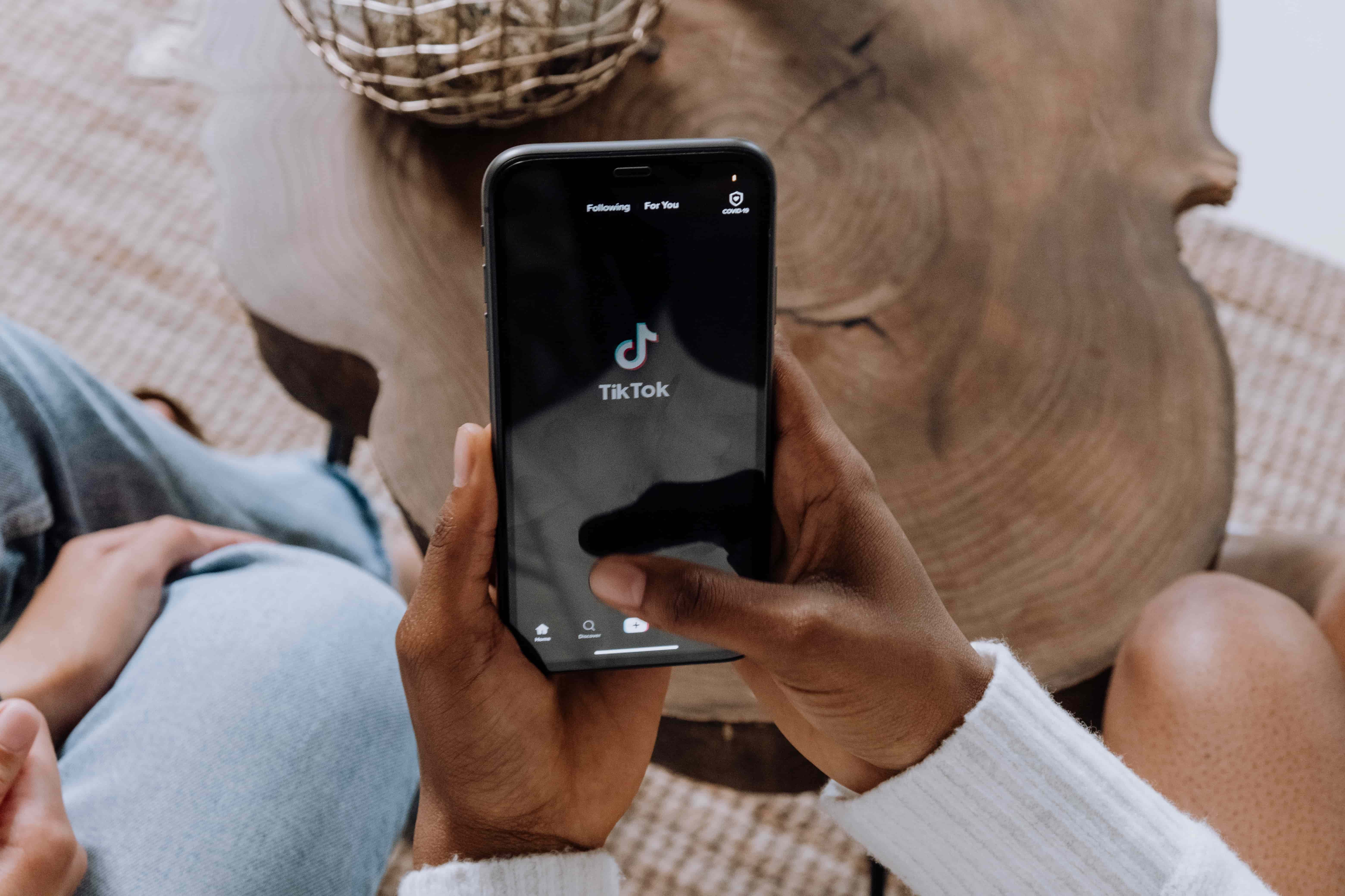 woman using tiktok to buy and sell products
